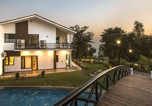 Riverside farmhouse with scenic Ganga view and event lawn